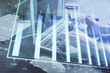 © peshkova - Double exposure of woman hands typing on computer and forex chart hologram drawing. Stock market invest concept.