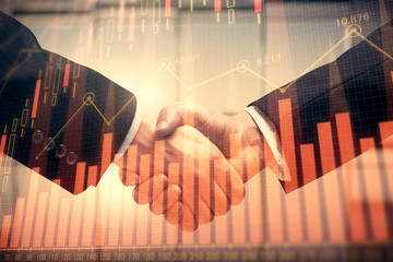 Double exposure of forex graph hologram and handshake of two men. Stock market concept.