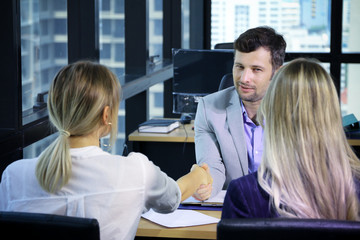 Business manager interview and talking with new employee woman with handshake agreement, apply a job or project discussion