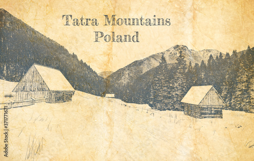 Snowy wooden cottages in wi...