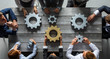 © alotofpeople - Business people joining gears