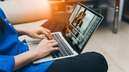 Concept of Job Search, find your career,Job Search Hiring on Website.businesswoman browsing human resources recruitment website and Online Job Search application on laptop computer  at home