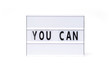  You can. text on a vintage lightbox display placed on a white table on a light background.    