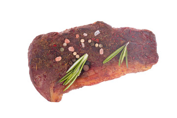 Wall Mural - slice of beef  with spices isolated on white background