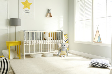 Wall Mural - Cute baby room interior with crib and big window