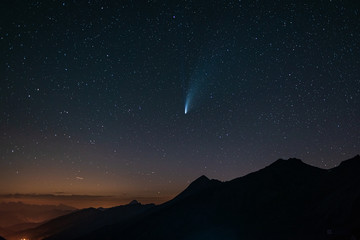 Wall Mural - comet neowise twin tails glowing in the night sky. telephoto view, details of the two star trails. o
