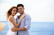 © New Africa - Happy couple on beach, space for text. Romantic walk