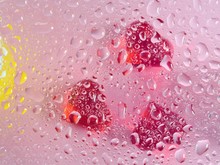 Concept Of Love, Three Red Hearts With Water Droplets Close-up, Abstract Pictured On A Light Background
