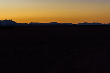 Sunset in arabian desert not far from the Hurghada city, Egypt