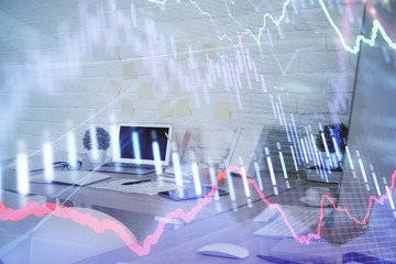 Multi exposure of stock market chart drawing and office interior background. Concept of financial analysis.