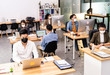 © vichie81 - Social distance office with business team wear face mask as new normal life