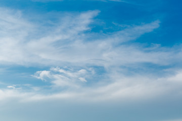 Wall Mural - beautiful blue sky with stretched white clouds