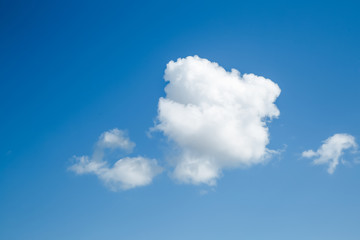 Wall Mural - white, fluffy clouds in blue sky. background from clouds