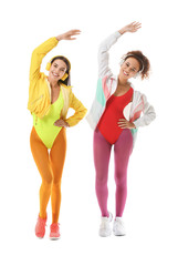 Wall Mural - Young women doing aerobics on white background