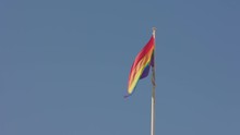 The LGBTQI Flag Flies Freely And Proudly Above The Pavillion On Bondi Beach On A Clear Blue Day.