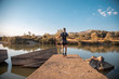 © robcartorres - man training next to river