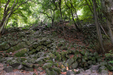 Famous basalt collapse created a so called ice dragon cave in an old vulcanic Hungarian mountain at Balaton called Szent György mountain, during autumn, sun is shining