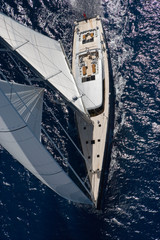 Luxury Sailing yacht. Sailing at Mediterranean Sea.  Palma de Mallorca Spain. Full sail. Aerial. Helicopter view. Super sailing yacht.