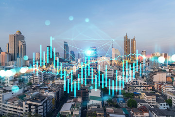 Wall Mural - sunset cityscape of big city view background with forex graph. success and finance concept. multiexp