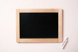 Background with chalkboard and chalk, overhead view