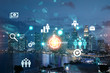 © VideoFlow - Technological development glowing icons. Night panoramic city view of Singapore. Concept of innovative activities expanding new services or products in Asia. Double exposure.