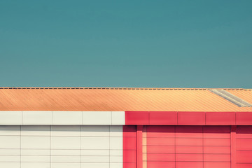 Poster - Warehouse roof. Close up of industrial park colorful facades.