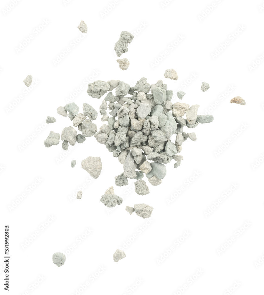 Gray small rocks ground texture isolated white background. black small road stone. gravel pebbles stone seamless texture. dark background of crushed granite gravel, close up. clumping clay