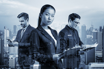 Group of three business colleagues in suits working on project together to gain new career opportunities. Concept of multinational corporate team. Kuala Lumpur. Double exposure.