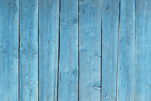 Blue Fence Made Of Old Wooden Boards, Texture And Structure Of Wood, Boards Close-up, Knots, Background For Design