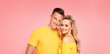 © neonshot - Beautiful young couple smiling.
