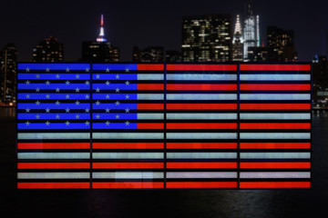 Wall Mural - American Flag made out of LED lights with NYC blurry skyscrapers in the background