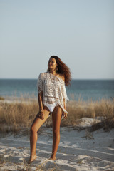 Wall Mural - Woman Resting on the Beach During Vacation