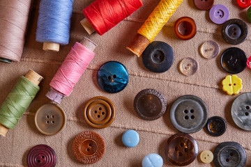 Poster - Background and texture of multicolored antique buttons