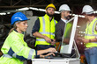 © Stella - Young beautiful woman industrial engineer worker wearing safely helmet and protective clothing using desktop computer at manufacturing industry plant factory