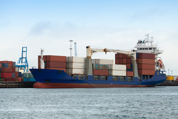 Container ship moored in port of Reykjavik