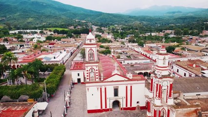 Wall Mural - Vista aerea iglesia paisaje de pueblo en Mexico tradicional