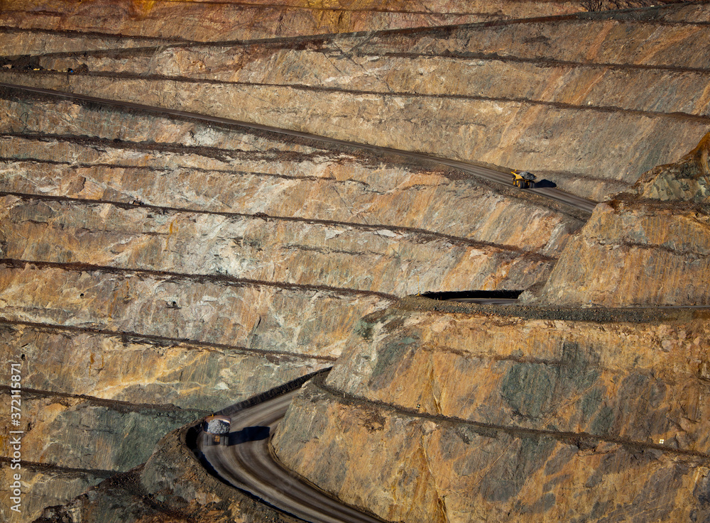 Modern Gold Mine in Kalgoorlie, Western Australia. Large truck transports gold ore from the Super Pit, Open cast mine.