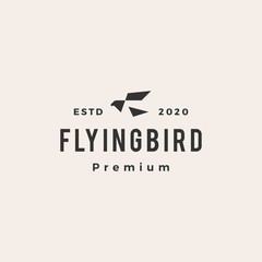 Wall Mural - flying bird hipster vintage logo vector icon illustration