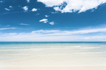 Wall Mural - Turquoise blue sea with white sand and sunny sky in summer with copy space