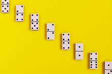 Vintage Old White Domino On A Yellow Background