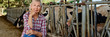 © JENOCHE - woman on rural farm with dairy cow
