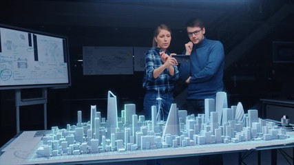 Wall Mural - architect and engineer have discussion, use augmented reality smartphone to design sustainable 3d me