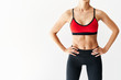 © GVS - Cropped image of fit woman torso  on white background with copy space