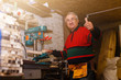 © Angelov - Carpenter works in a workshop for the production of vintage furniture