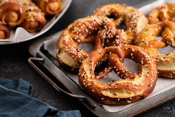 Wall Mural - Homemade whole meal pretzels with sesame and salt. Oktoberfest.