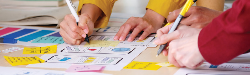 Wall Mural - brainstorm planing creative teamwork, close up of hands mobile phone app developer team meeting abou