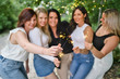 © Louis-Paul Photo - Group of girls friends having good time together with bengal lights