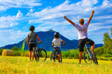 Wall Mural - happy family with mountain bike- Auvergne in France