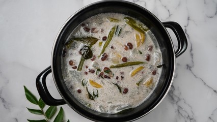 Wall Mural - Kerala Olan recipe - Traditional side dish prepared during Onam feast with Ash-gourd plantains and red beans