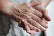 © Elena - hands of an adult woman close up, mother s hands